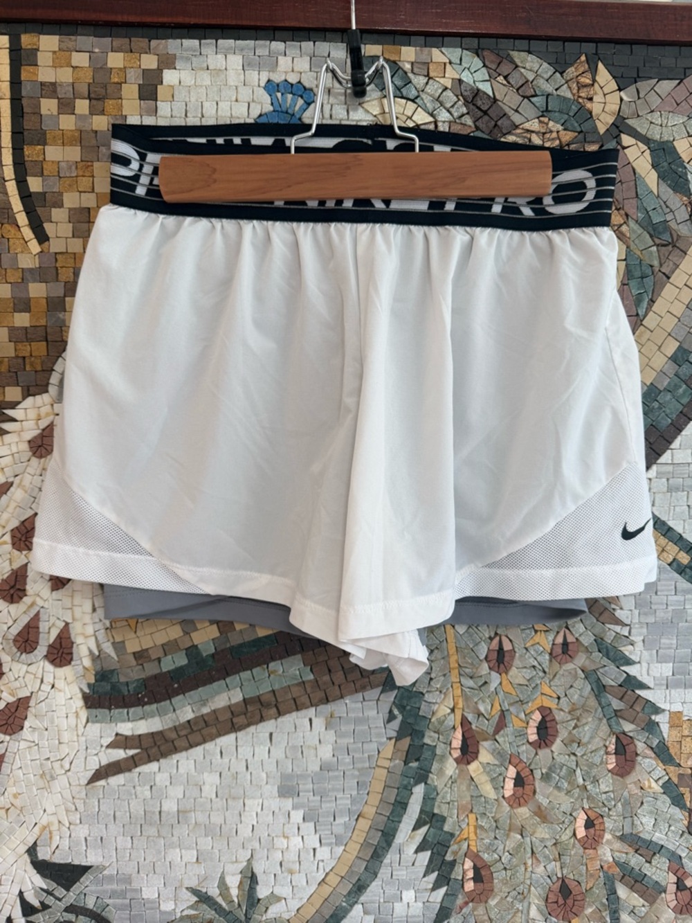 Nike Women's White Athletic Skort with Black Branded Waistband
